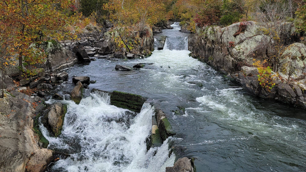several water cascades flow along the Potomac River at Great Falls in Maryland
