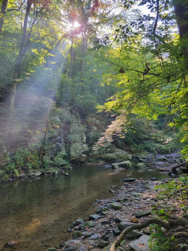 Large rocks and boulders line the Mill Creek at Rolling Hill Park