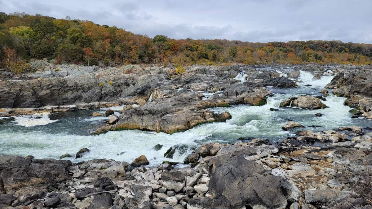 water cascades over rocks in the Potomac River