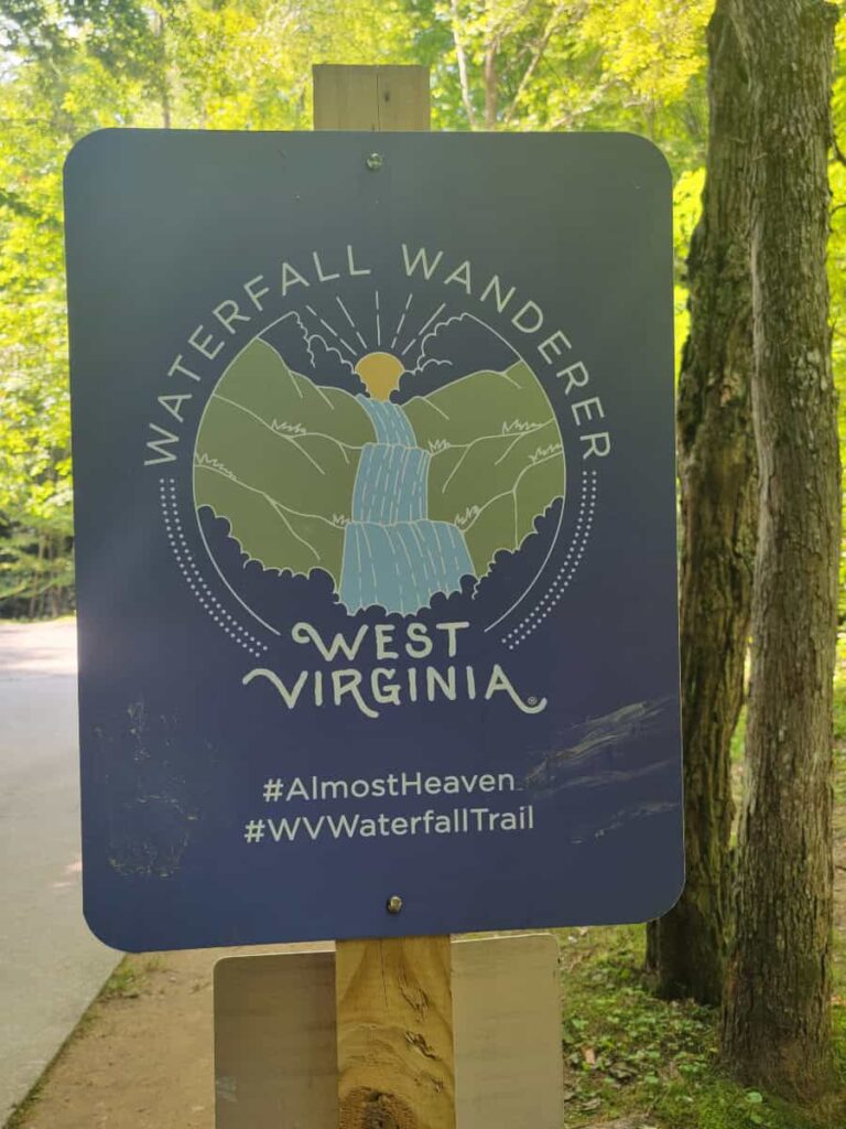 sign reads "waterfall wanderer West Virginia"