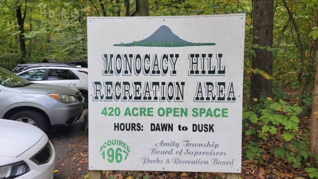 A sign in a parking lot reads "Monocacy Hill Recreation Area"