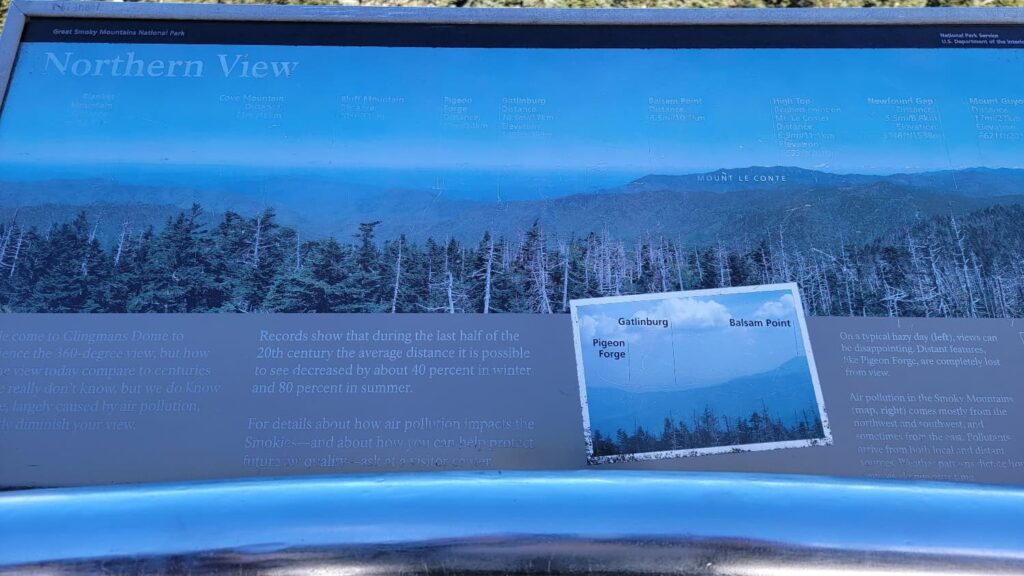 sign at the Kuwohi  Clingmans Dome obervation tower shows visitors what they can see when looking in that direction