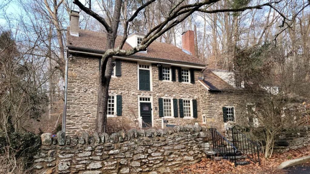 a stone home built in late 1700s sits in Wissahickon Valley Park
