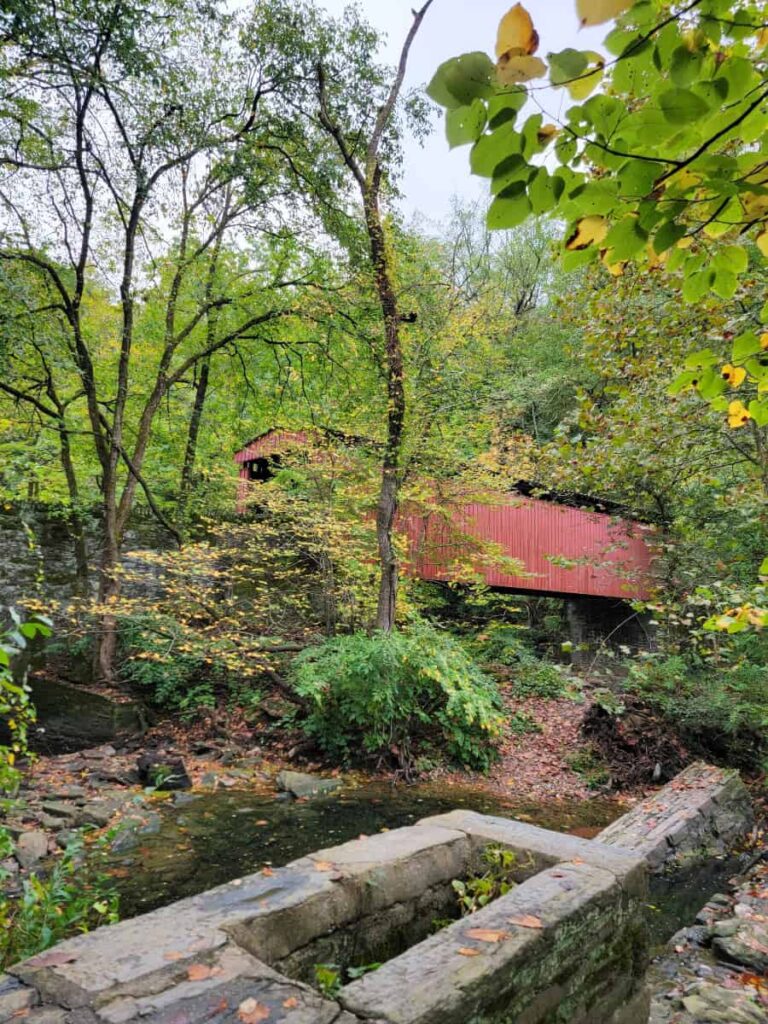 A red covered bridge sits in Wissahickon Valley park