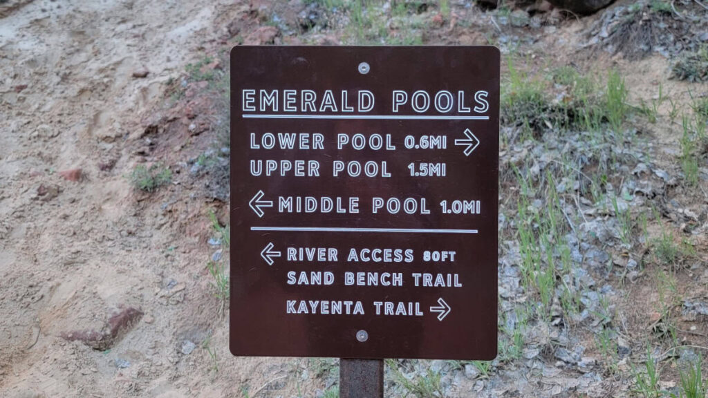 A sign indicates directions for the Emerald Pools Lower Pools and Middle Pools Trails