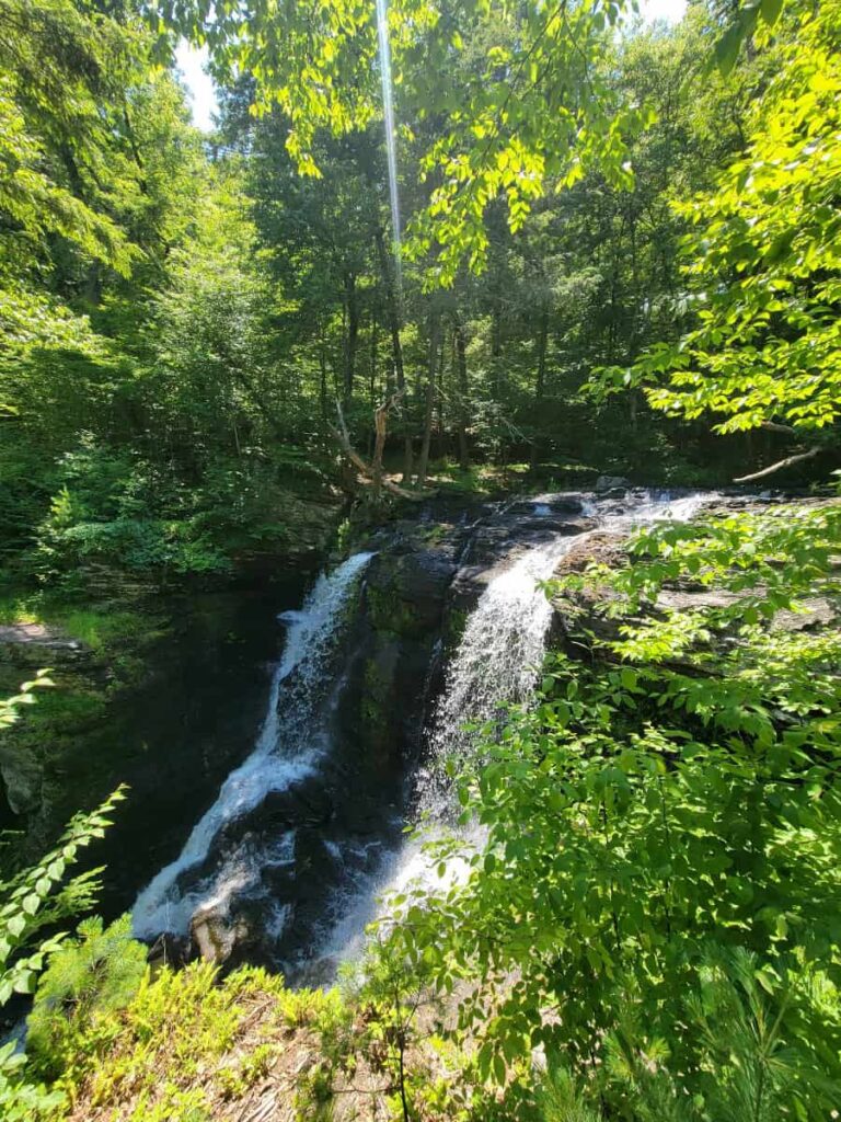 The water flows over a rocky edge at George W Childs Park