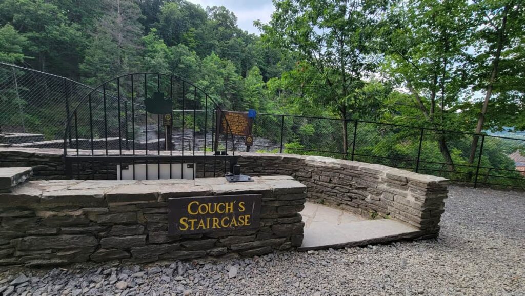 A stone staircase named "Couch's Staircase" descends into Watkins Glen Gorge Trail