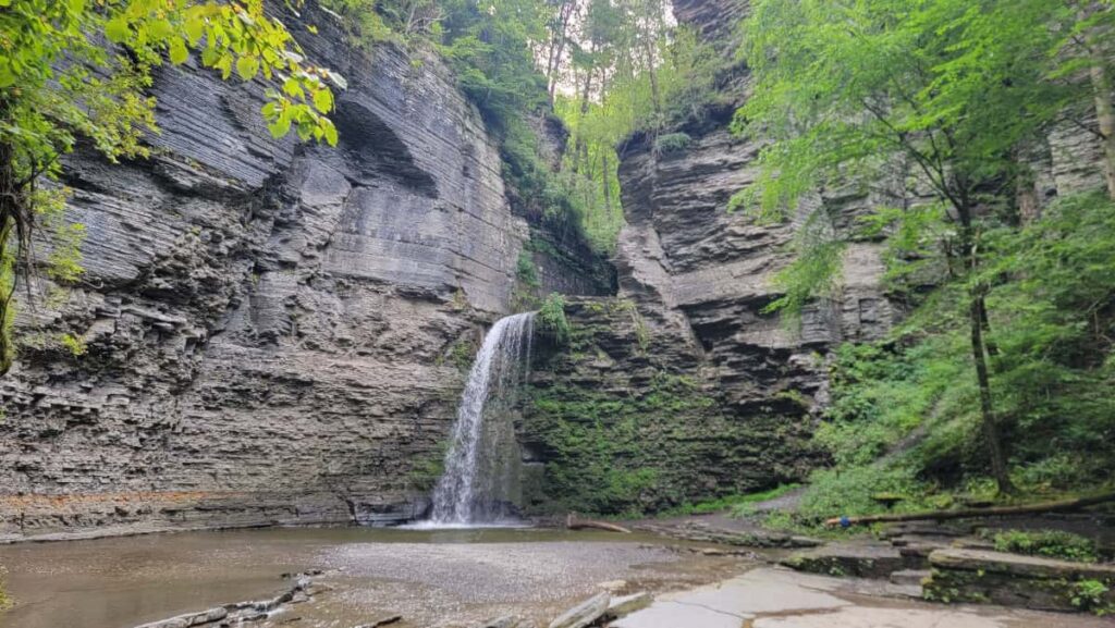water flows over Eagle Cliff forming a pool at the bottom