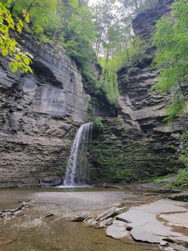 Eagle Cliff towers over a natural pool created by the 41-foot waterfall