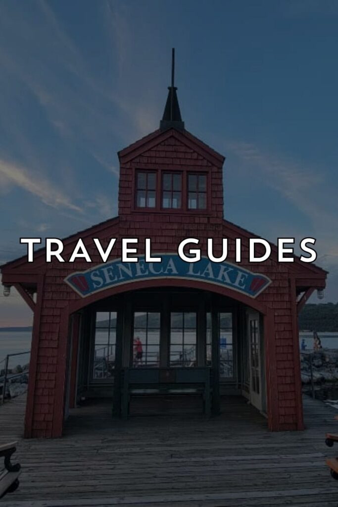 a photo of a building at Seneca Lake with "travel guides" text over